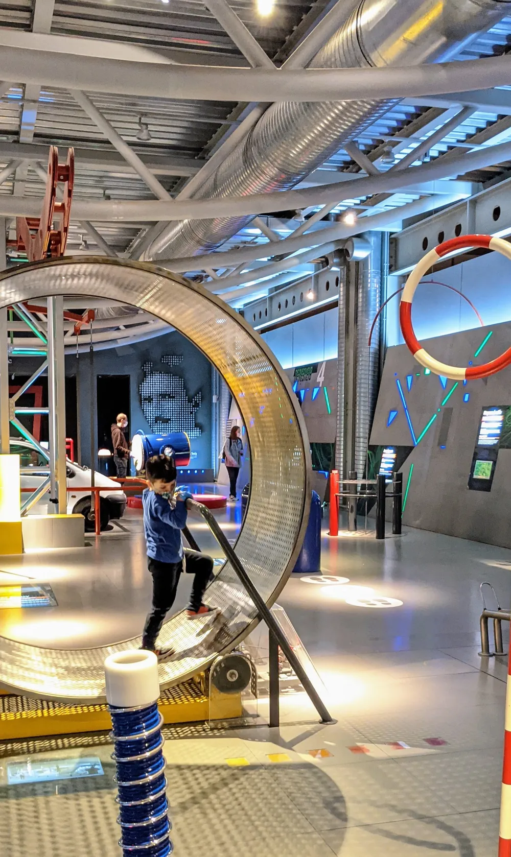 A child exploring an interactive exhibit at the NOESIS Science Center